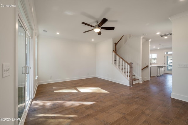 427 Parkside Commons, Bluffton, SC 29910 - unfurnished room featuring dark wood-style flooring, a ceiling fan, stairway, and recessed lighting