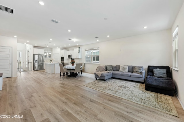 living room featuring light hardwood / wood-style floors