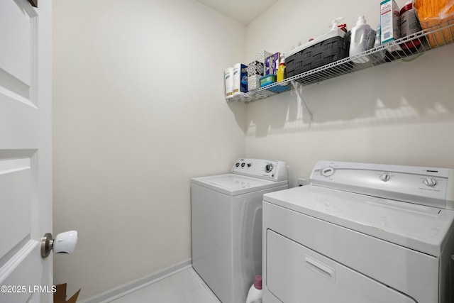 laundry area with washing machine and dryer