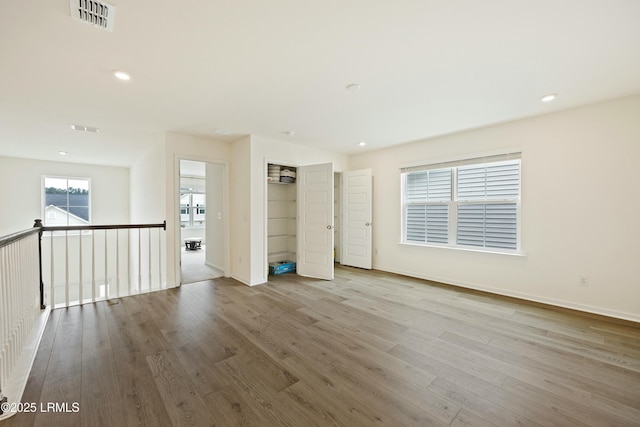 empty room featuring hardwood / wood-style floors