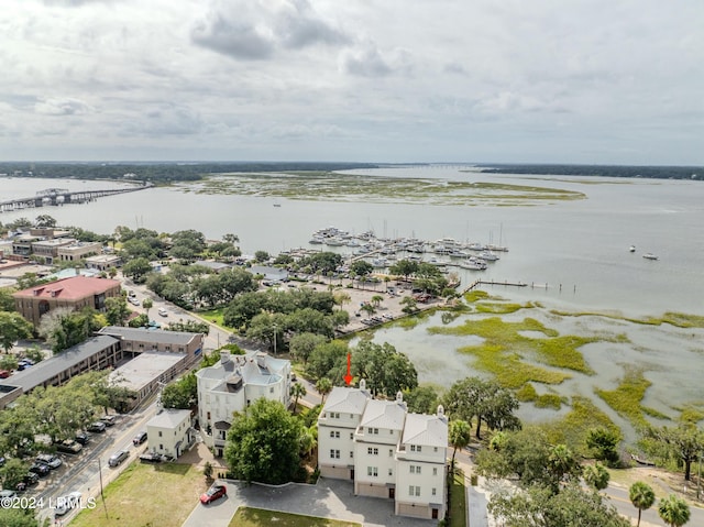 birds eye view of property featuring a water view