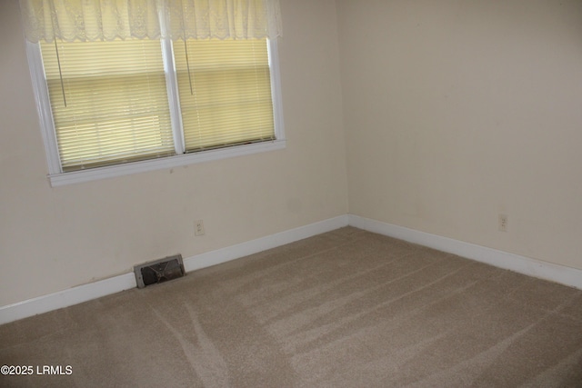 1933 Bamberg Hwy, Hampton, SC 29924 - spare room featuring carpet flooring and baseboards