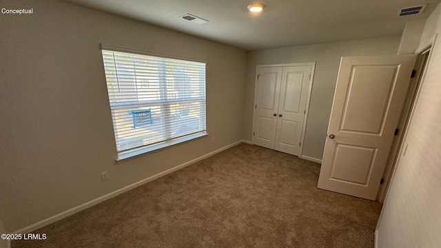 24 Twickenham Loop, Yemassee, SC 29945 - unfurnished bedroom featuring carpet and a closet