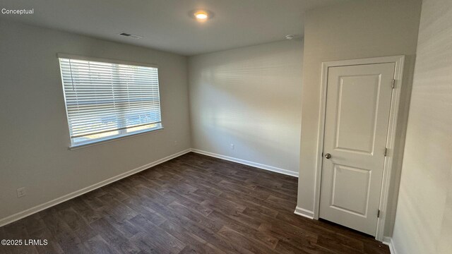 24 Twickenham Loop, Yemassee, SC 29945 - unfurnished room with dark wood-style floors and baseboards