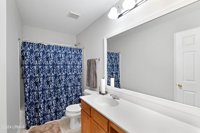 full bathroom featuring vanity, shower / bath combo, tile patterned floors, and toilet