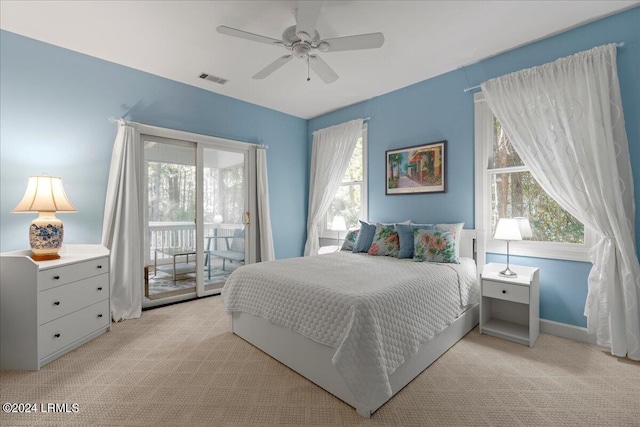 carpeted bedroom with access to exterior and ceiling fan