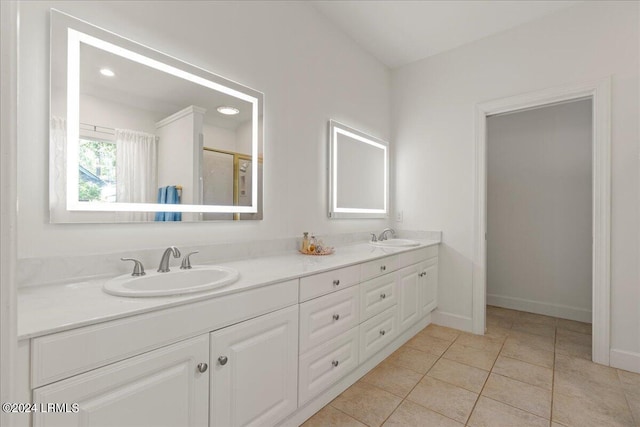 bathroom featuring tile patterned floors and vanity