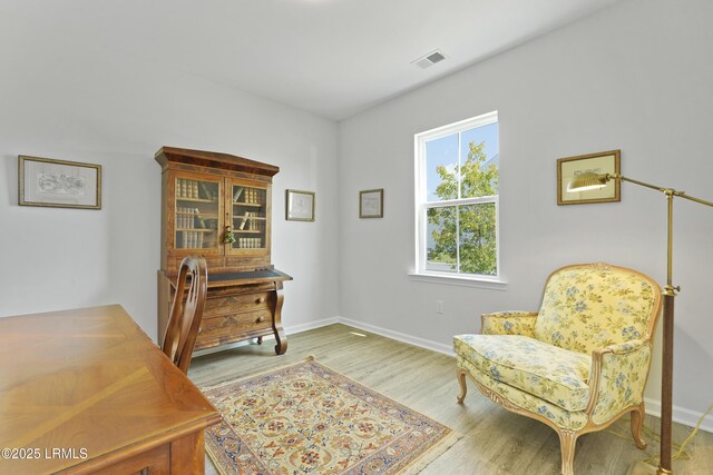257 Garden Gate Cir E, Hardeeville, SC 29927 - sitting room featuring wood finished floors and baseboards