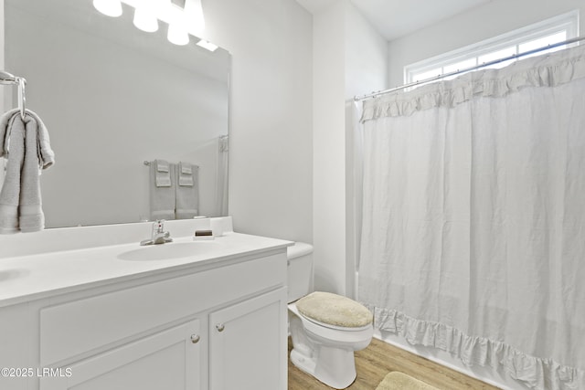 257 Garden Gate Cir E, Hardeeville, SC 29927 - bathroom featuring vanity, wood finished floors, and shower / tub combo with curtain
