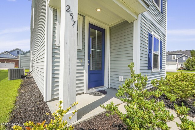 257 Garden Gate Cir E, Hardeeville, SC 29927 - view of exterior entry featuring a porch