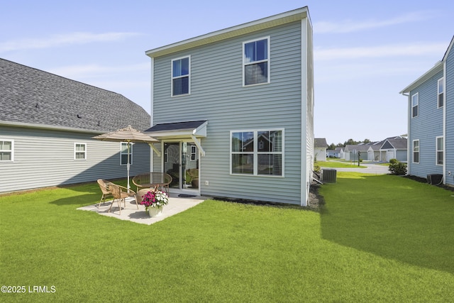 257 Garden Gate Cir E, Hardeeville, SC 29927 - back of house featuring a patio and a yard