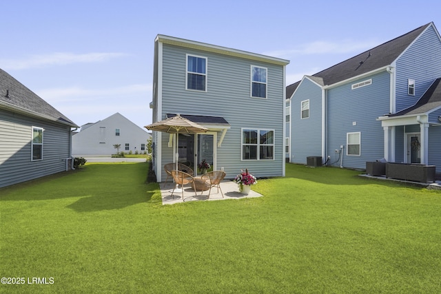 257 Garden Gate Cir E, Hardeeville, SC 29927 - rear view of house featuring a patio area and a yard