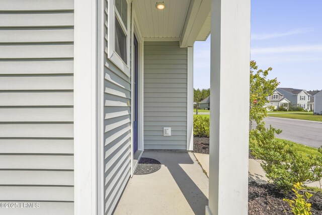 257 Garden Gate Cir E, Hardeeville, SC 29927 - view of exterior entry with a residential view