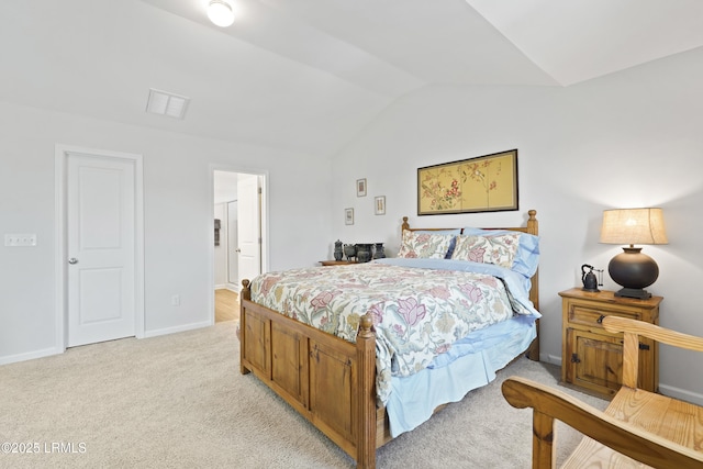 257 Garden Gate Cir E, Hardeeville, SC 29927 - bedroom featuring lofted ceiling, light colored carpet, and ensuite bathroom