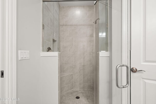 full bathroom with a shower stall