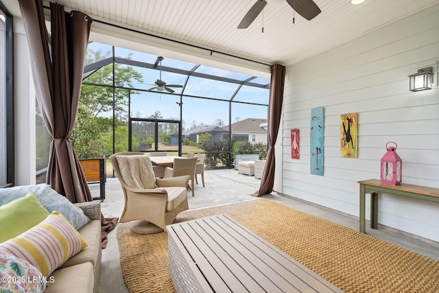 sunroom / solarium with an outdoor living space and a ceiling fan