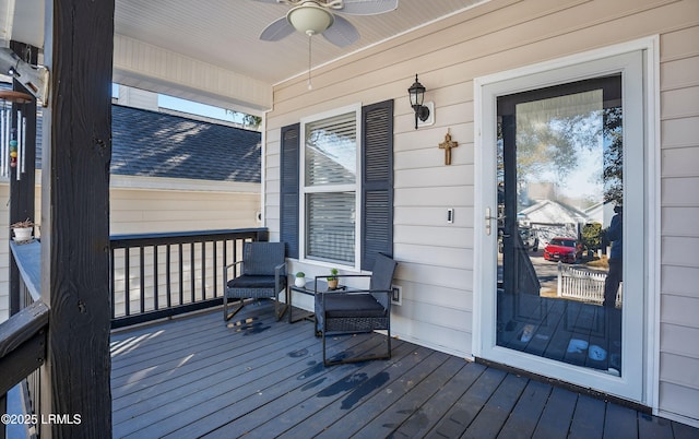 deck featuring a porch and ceiling fan