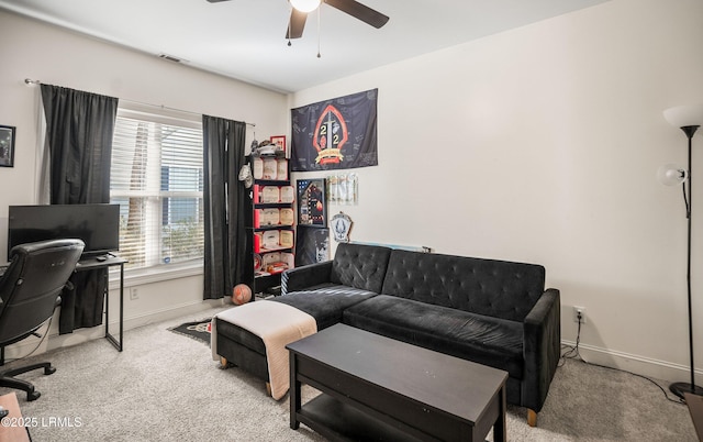 carpeted office with ceiling fan and a wealth of natural light