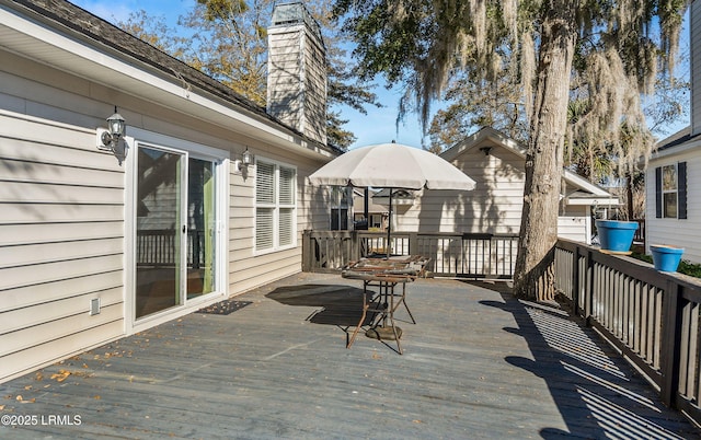 wooden deck featuring a gazebo