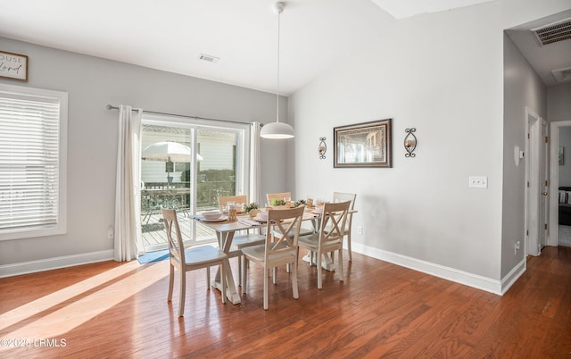 dining room with hardwood / wood-style floors