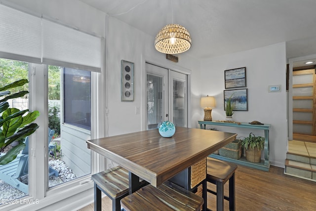 20 Queens Folly Rd Unit 1967, Hilton Head Island, SC 29928 - dining area featuring a chandelier, wood finished floors, and stairs