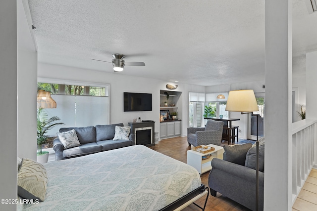 20 Queens Folly Rd Unit 1967, Hilton Head Island, SC 29928 - bedroom featuring multiple windows, a textured ceiling, and baseboards