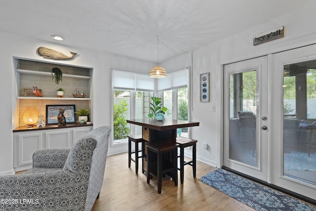 20 Queens Folly Rd Unit 1967, Hilton Head Island, SC 29928 - dining room featuring wood finished floors and a textured ceiling