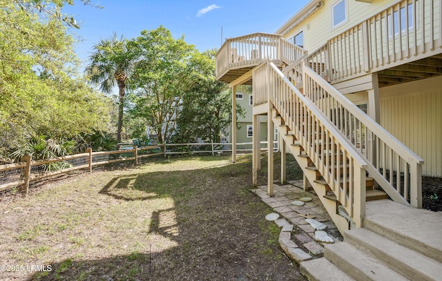 3 Ocean Marsh Ln, Harbor Island, SC 29920 - fenced backyard featuring stairs and a wooden deck