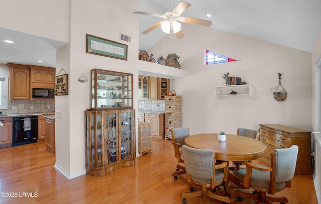 3 Ocean Marsh Ln, Harbor Island, SC 29920 - dining space featuring a ceiling fan, light wood-style flooring, recessed lighting, and high vaulted ceiling