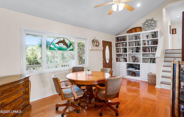 3 Ocean Marsh Ln, Harbor Island, SC 29920 - dining area featuring light wood finished floors, a ceiling fan, and vaulted ceiling