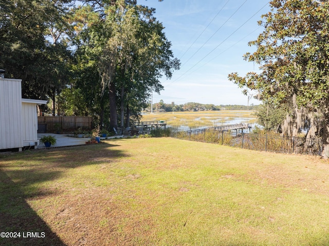 view of yard with a water view