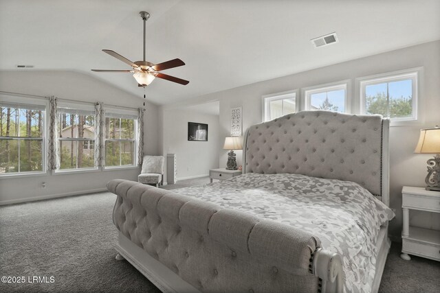 carpeted bedroom featuring a ceiling fan, baseboards, lofted ceiling, and visible vents