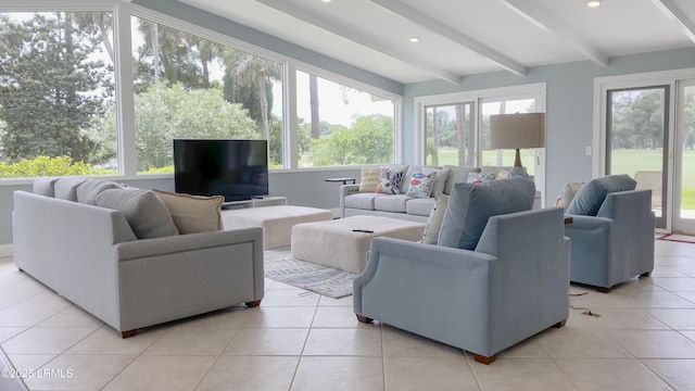 tiled living room with beamed ceiling