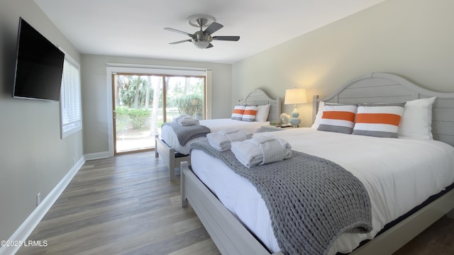 bedroom featuring wood-type flooring, access to outside, and ceiling fan