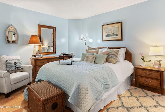 bedroom featuring light hardwood / wood-style floors