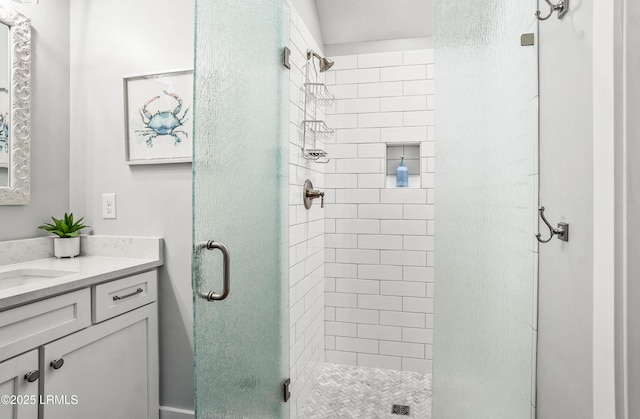 bathroom with vanity and walk in shower