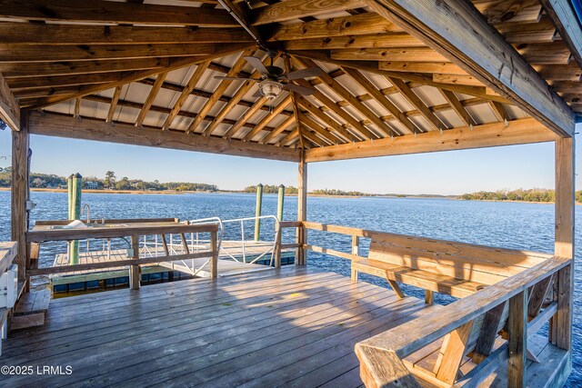 dock area featuring a gazebo and a water view