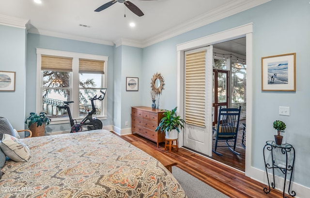 bedroom featuring crown molding, ceiling fan, and hardwood / wood-style floors