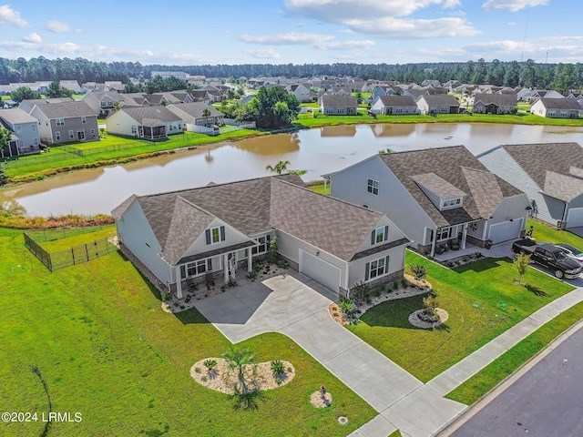 aerial view featuring a water view and a residential view