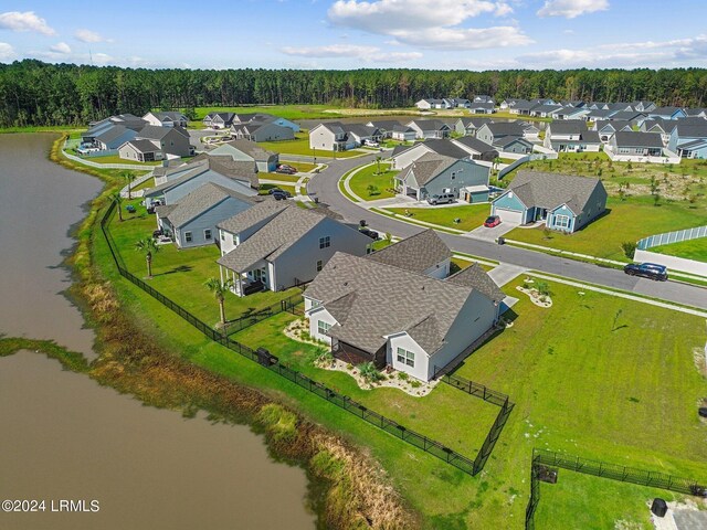 aerial view featuring a water view and a residential view