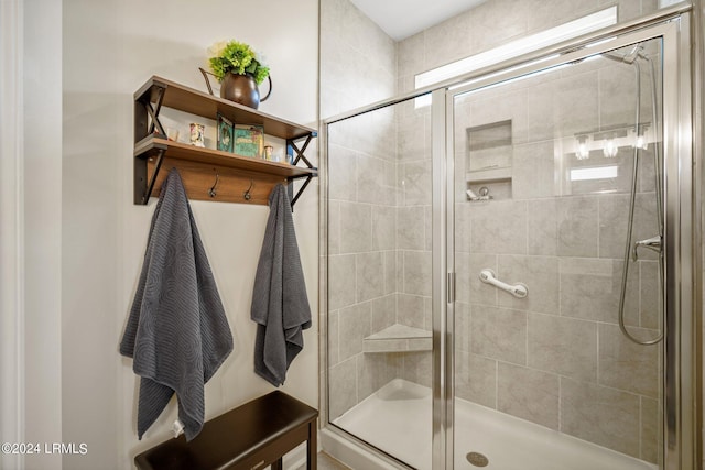 bathroom featuring a stall shower