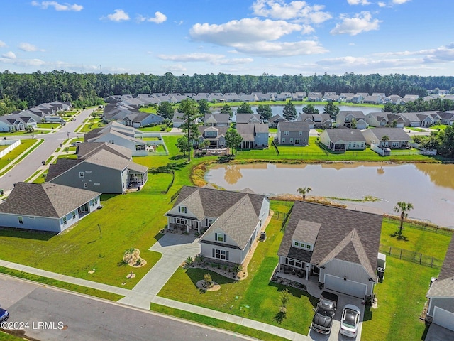 birds eye view of property featuring a residential view and a water view