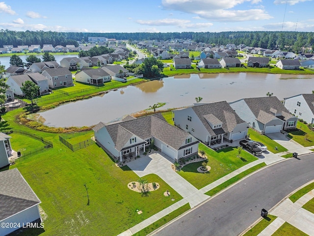 aerial view featuring a water view and a residential view