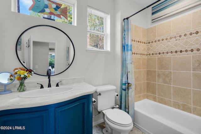 full bathroom with shower / bathtub combination with curtain, vanity, and toilet