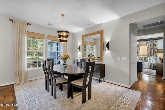 dining room with a chandelier