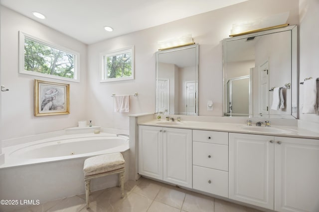 2 Lenox Ln, Hilton Head Island, SC 29926 - full bathroom featuring double vanity, a garden tub, a stall shower, and tile patterned floors