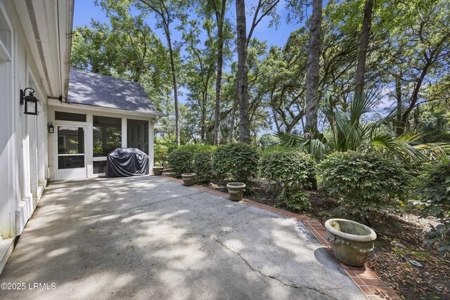 2 Lenox Ln, Hilton Head Island, SC 29926 - view of patio with a sunroom and grilling area