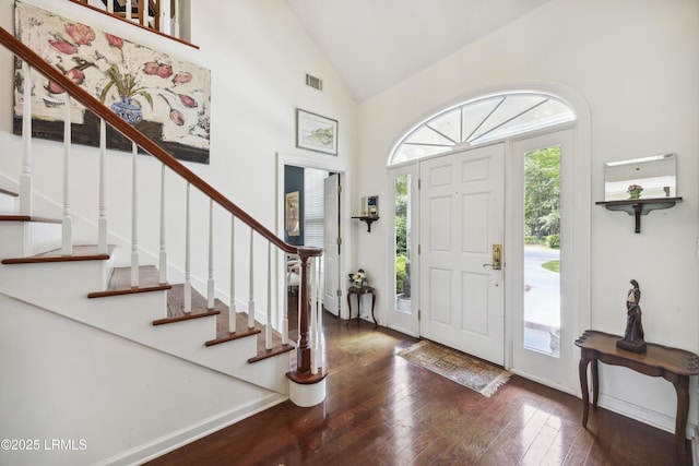 2 Lenox Ln, Hilton Head Island, SC 29926 - entrance foyer with hardwood / wood-style flooring, stairs, and high vaulted ceiling