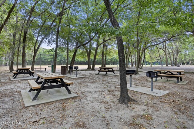 2 Lenox Ln, Hilton Head Island, SC 29926 - view of home's community featuring view of wooded area