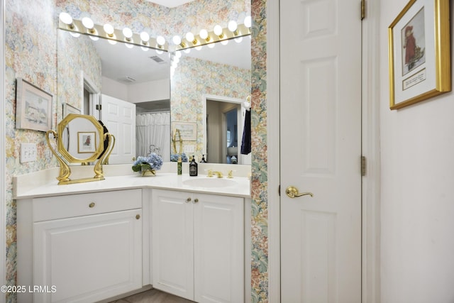 2 Lenox Ln, Hilton Head Island, SC 29926 - full bath with wallpapered walls and vanity